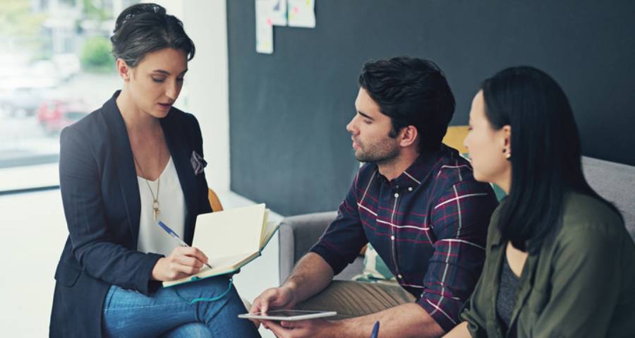 Study abroad consultant Ahmedabad — college counsellor meeting with students for overseas education guidance