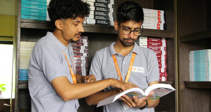 : Indian students working together on a university campus — showing the ambition that takes Gujarati medium students from Ahmedabad to global universities 