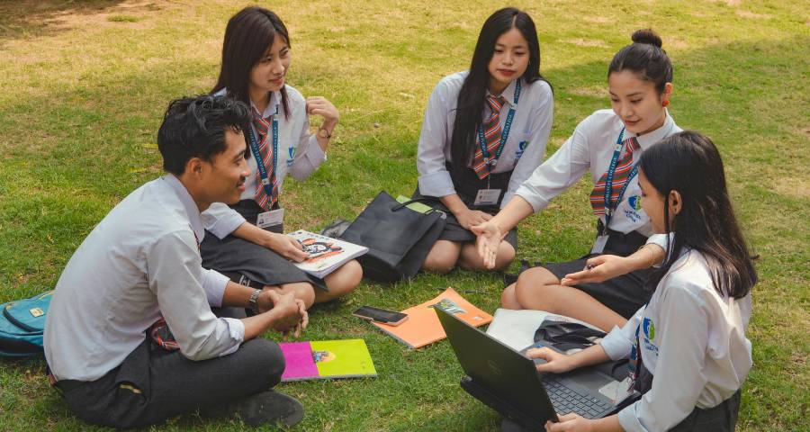 Indian students studying together on university campus