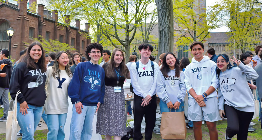 Students from different backgrounds walking together on a university campus — the diverse global community Indian students join at Harvard Yale or Princeton