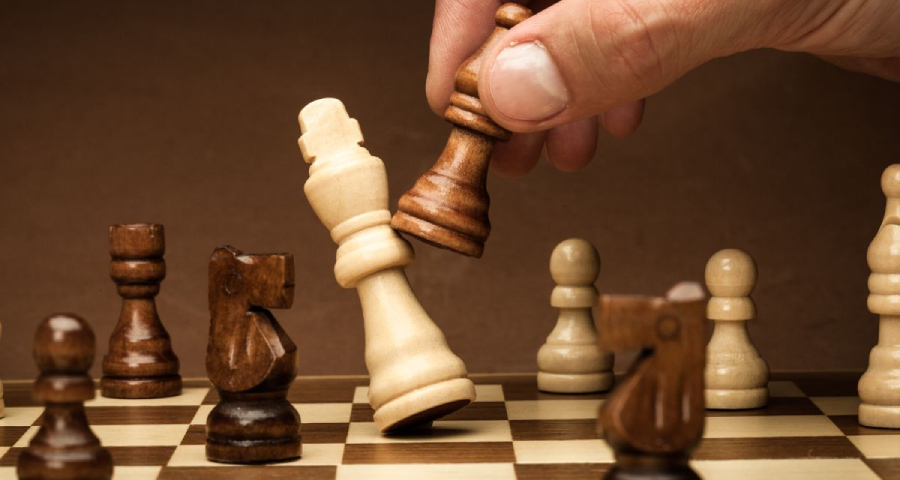 INDIAN STUDENT PLAYING CHESS PRESENTING INDIA GUJRAT
